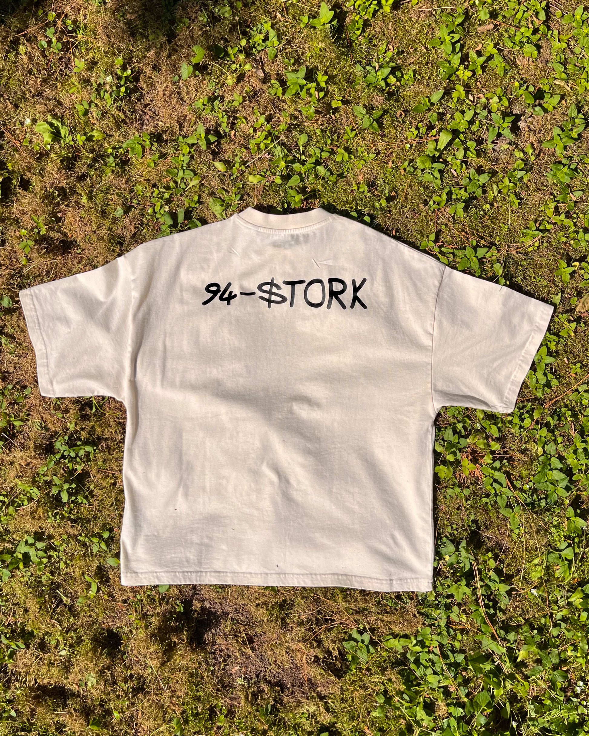 06. "94-$TORK" - Loose-Fit Tee Off-White