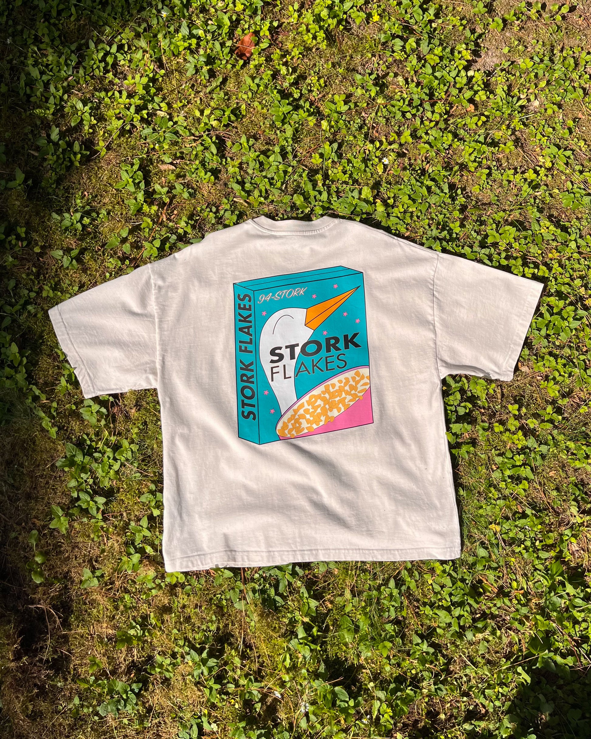 02. "FLAKES" - Loose-Fit Tee Off-White